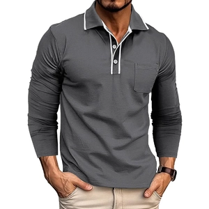 Close-up of grey long-sleeve polo shirt with contrast white piping and chest pocket detail