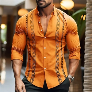 Detail showing ginger yellow shirt with vertical black geometric pattern and cotton linen texture
