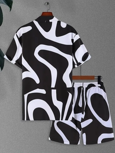 Close-up of lightweight summer set featuring black and white abstract geometric prints