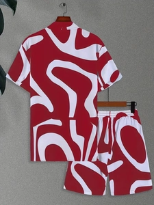 Detail of red and white coconut tree print short sleeve shirt and shorts casual set