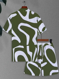 Detailed view of casual short-sleeved set with green organic wave pattern and elastic waist