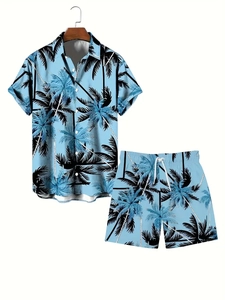 Detail of light blue short-sleeved shirt and shorts set with black coconut tree prints