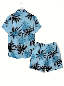 Flat lay of men's blue tropical palm tree print short sleeve shirt and shorts set