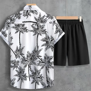Detail view of men's summer set with white palm print shirt and black casual shorts