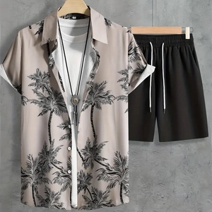Detail view of men's summer Hawaiian shirt with palm print and drawstring shorts