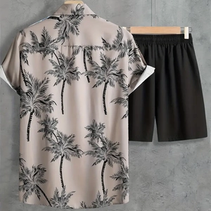 Back view of summer Hawaiian shirt with coconut tree print and black elastic waist shorts