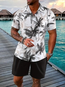 Men's summer set featuring white short sleeve shirt with tropical palm tree print and black shorts