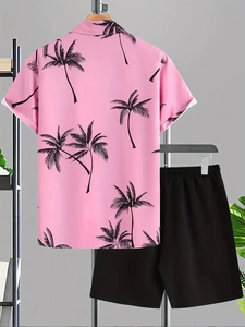 Back view of a casual pink coconut tree print shirt and black shorts summer set