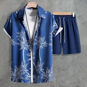 Detailed view of men's blue hawaiian shirt with coconut trees and drawstring shorts
