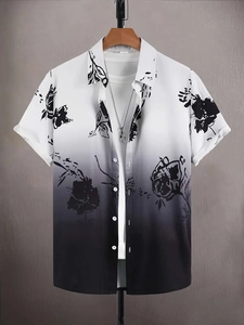 Détail d'une chemise homme à manches courtes avec imprimé floral et dégradé noir
