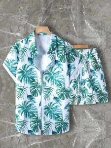 Close-up of tropical palm leaf print and elastic waistband on men's summer set