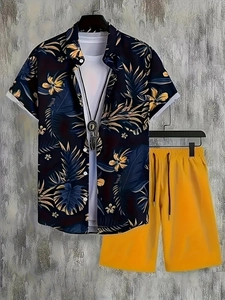 Detail of men summer set with tropical coconut tree shirt and yellow drawstring shorts