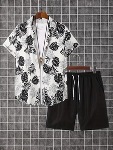 Detail of summer set showing tropical coconut tree print shirt and black drawstring shorts