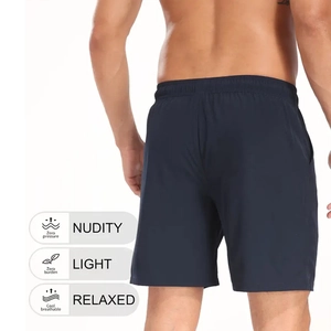 Détail du short de bain bleu marine à séchage rapide avec taille élastique et poches