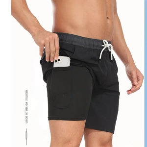 Détail du short 2 en 1 pour homme montrant la poche cachée pour téléphone sur la couche interne