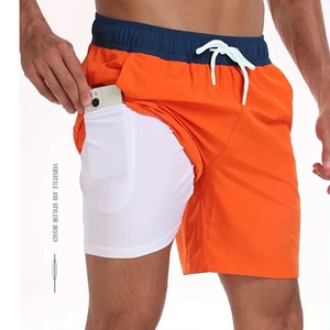 Short de plage 2-en-1 orange pour homme avec poche de téléphone et doublure de compression
