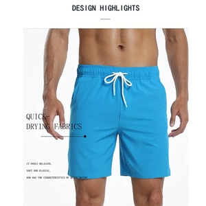 Détail du short de bain homme à séchage rapide avec cordon blanc et taille élastique douce