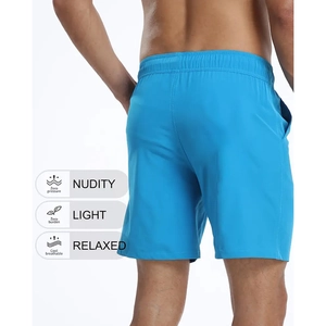 Détail du short de bain bleu cyan pour homme avec taille élastique et poches latérales