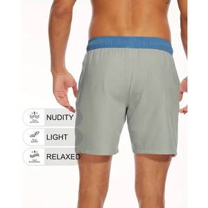Vue arrière du short de plage décontracté pour hommes avec taille élastique bleue et tissu gris