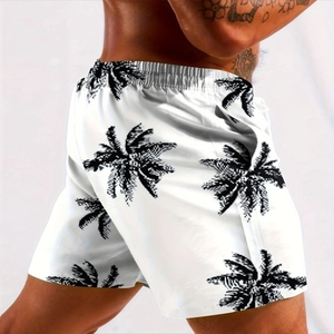 Men's quick-dry Hawaiian beach shorts with black palm tree patterns on white fabric