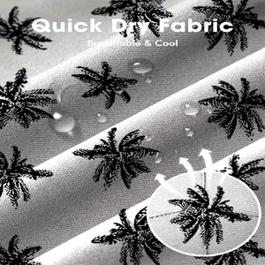 Detail of quick dry breathable fabric with black palm tree prints and water droplets
