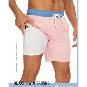 Détail du short de bain rose pour homme avec double couche et poche pour téléphone