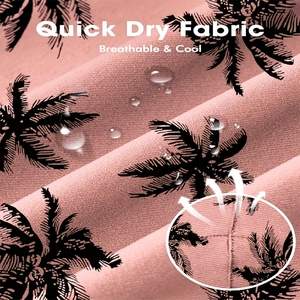 Macro shot of quick dry fabric with black palm trees and water droplets for beach shorts