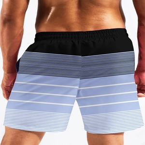 Rear view of men's quick-dry beach shorts with striped patchwork design and elastic waist