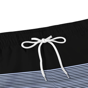 Close-up of drawstring waist on men's beach shorts with blue stripes and quick-dry texture