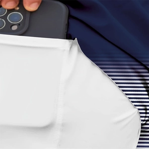 Detail shot of deep pocket depth on navy blue striped men's casual beach shorts