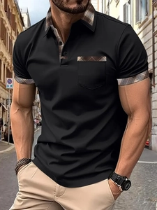 Detail of men's black polo shirt featuring stylish plaid patchwork on collar and sleeve cuffs