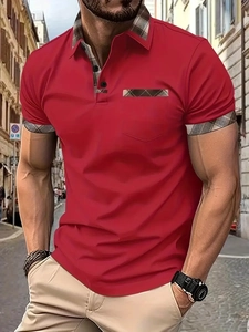 Detailed close-up of red polo shirt showing plaid patchwork on collar and pocket