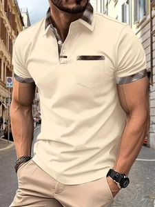 Detail of plaid collar and sleeve trim on a beige short-sleeved cotton polo shirt for men