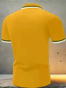 Back view of yellow slim fit men polo shirt featuring green white striped ribbed collar
