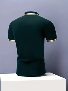 Detail view of the dark green slim fit polo shirt back with striped collar and sleeve cuffs