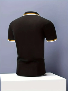 Rear view of a black slim fit Polo shirt featuring ribbed yellow and white striped cuffs
