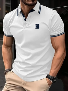 Detailed view of the ribbed polo collar and Brooklyn embroidery on white cotton fabric