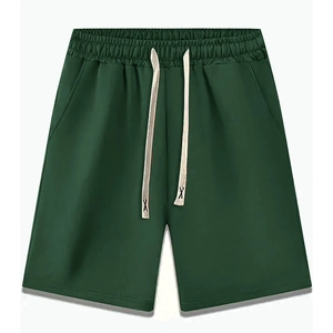 Detail of dark green men's plus size shorts featuring elastic waist and white drawstring