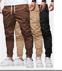Mens solid color jogger sweatpants shown in brown, khaki, and black with ribbed cuffs