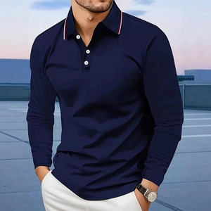 Detail of navy men's polo shirt with red and white striped ribbed collar and buttons