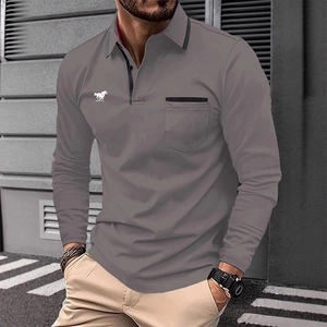 Close-up of grey long-sleeved polo shirt with embroidered horse logo and chest pocket