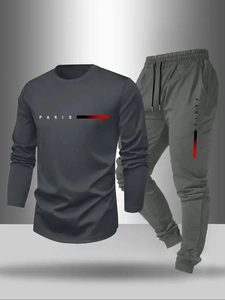 Detail of grey tracksuit with PARIS letter print and red gradient stripe design