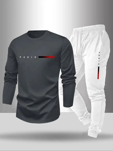 Detail of grey long sleeve shirt and white pants with Paris letter print on sportswear set