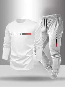 Detail of white long-sleeve T-shirt and grey joggers with Paris logo print