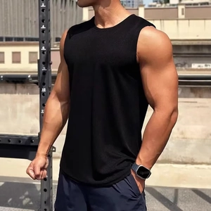 Detail of black slim-fit sleeveless workout tank top showing breathable fabric texture