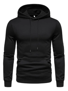 Detail view of black drawstring hoodie showing ribbed cuffs and kangaroo pocket texture