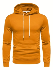 Detailed macro view of yellow hoodie showing white contrast drawstrings and ribbed cuffs