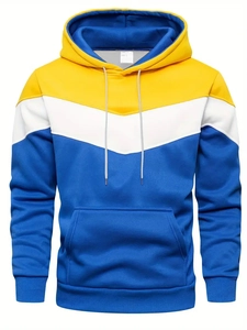 Detail of color-block hoodie with yellow, white and blue panels and kangaroo pocket