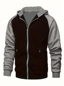 Detail view of contrast stitching and metal zipper on this color block hoodie