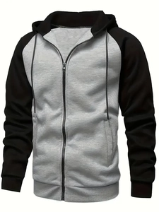 Detail of color-block hooded sweatshirt with full zipper and ribbed cuffs for men